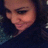Pixelated close-up of a person's face with dark hair, neutral expression, and no visible clothing or background details.