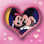 Pixelated cartoon icon of Mickey and Minnie Mouse kissing inside a heart-shaped frame on pink background with floating hearts.