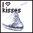 Pixelated icon with 'I ❤️ kisses' text above a Hershey's Kiss chocolate, showing two animation frames where the word 'kisses' changes from solid black to pixelated gray.