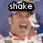 A person in a racing uniform and cap appears across three with changing text overlays: shake, and, bake