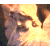 Pixelated image of a light-colored dog with dark patches on its face and ears, positioned next to green text reading 'Original Icons .com' on a solid background.