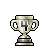 Pixel art trophy with two handles, base, and central vertical bar, rendered in beige, green, and gray tones on a solid gray background.