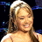 A pixelated contact sheet showing two frames of an animated icon featuring a woman on the left and green text on the right against a dark background.