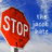Red octagonal stop sign with white 'STOP' text against blue sky background, pixelated rendering.