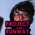 A pixelated image of a person with dark hair and glasses, featuring text overlays in pink block letters on black backgrounds.
