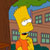 Yellow-skinned cartoon character with spiky hair, orange shirt, and black pants stands in front of brown building with green windows.