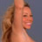 Static 48x48 pixel icon showing a close-up of a person with long brown hair and light skin against a solid blue background, rendered in low-resolution pixel art style.