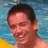 A pixelated image divided into four quadrants with a person in the top-left, text in the top-right and bottom-left, and a gray area in the bottom-right.