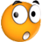 Two orange circular faces with wide eyes and open mouths, one with pupils and the other without, both with black eyebrows.
