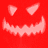 Red background with three light pink jack-o'-lantern faces showing different expressions and mouth shapes.
