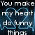 Pixelated text reads 'You make my heart do funny things' with a blue heart-shaped ECG line on a dark background, alternating between white and red text colors.