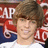 Pixelated image of a person with brown hair and a white shirt, with text elements including 'Ryan Sheckler' and '<333' on black and gray backgrounds.