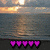 Pixelated sunset over water with five purple heart shapes at the bottom.