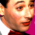 Pixelated buddy icon featuring a partial face on left and bold text "I love the 80's" on right with pink and cyan background blocks.