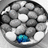 A circular arrangement of gray and white stones with one blue stone, next to a light blue background displaying pixelated text reading "Dare to be... DIFFERENT".