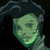 Pixelated green-tinted face with dark hair against black background, static image with no visible text or additional elements.