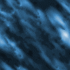Two side-by-side animated show diagonal streaks of light blue and purple with bright white highlights moving across dark backgrounds