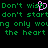 Green pixelated text on black background with a pink heart symbol replacing the 'o' in 'wish', repeating across multiple lines.