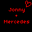 Red pixelated text and symbols on black background: 'Jonny' above '+' above 'Mercedes', with a heart symbol above the left 'Jonny'.