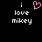 Pixelated text 'i love mikey' in white on black background with a pink heart symbol replacing the 'o' in 'love' in one view.