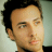 Static 48x48 pixel icon showing a close-up of a person's face with dark hair and light skin, rendered in low-resolution pixel art style against a gradient background.