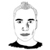 Pixelated grayscale portrait of a person with short hair, neutral expression, and dark clothing collar against white background.
