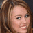 Pixelated image of a person with light brown hair and blue eyes, next to orange pixelated text on dark red background.