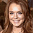 Pixelated image of a smiling woman with long brown hair on left, blue text on yellow background reading "Even lindsay is cooler then KT TORI LANDSHULZ and GREENSTONE PUT TOGETHER!!!".