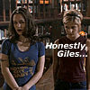 Two women stand in a library; one wears a blue shirt with yellow text, the other a maroon shirt. Text overlays change sequentially.