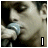 Four- shows a person singing into a microphone, with text overlays reading 'I', 'walk', 'alone', and a star symbol