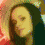 Four pixelated portrait arranged in a showing a person with long dark hair in varying poses and color filters