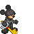 Pixelated character in dark hooded outfit with yellow accents, holding key-shaped weapon and emitting blue energy effects across multiple poses.