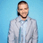 Pixelated image of a person in light gray suit against blue background with pink text reading "I Love Justin Timberlake" on dark blue