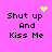 Pixelated text 'Shut up And Kiss Me' on bright pink background with yellow heart and starburst symbols.