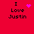 Red background with black text "I Love Justin" and four distinct purple pixelated symbols in different positions.