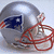 Silver football helmet with red facemask and blue logo, text overlays reading "Super Bowl XLI..." and "soon to be champs!"