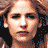 A 3x2 contact sheet of pixelated animated frames showing a woman with changing facial expressions and hair, overlaid with a red banner containing "Coolbuddy.com" text.