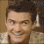 Four- shows a person with dark hair in three different poses and one red-orange gradient with blue text reading orlando bloom