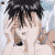 Pixelated anime-style character with black spiky hair and light skin, shown in multiple expressions against a white background.