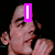Pixelated image of a person with raised hand, overlaid with pink text reading 'I Love Joe Jonas' on black background.