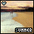 Pixelated beach scene with sunset sky, water reflections, and 'SUMMER' text below; heart symbol in top-left corner.
