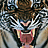 Pixelated tiger face with open mouth showing teeth and tongue, white whiskers on dark fur background.