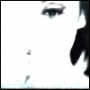 A black-and-white animated sequence of a woman's face in various expressions and angles, with the text 'caroline' visible in