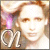 Pixelated static image of a person with light brown hair, closed eyes, and a faint smile, with stylized text 'QL' in the lower-left corner.