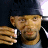 A 48x48 pixel buddy icon featuring a split composition with a person on the left and a digital display panel showing text on the right, rendered in low-resolution pixel art style.