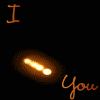 Animated sequence of glowing orange neon lines forming a heart shape with 'I' and 'You' text on a black background.