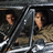 Pixelated image of a person in a vehicle with visible text 'My Liifeee' at bottom right.