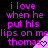 Pixelated text repeats across a black background with pink and purple hues, featuring heart symbols in the lower-right corner of each repeated section.