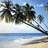 Pixelated beach scene with palm trees, blue sky, and ocean water on sandy shore.