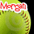 A green softball with red stitching and the name 'Morgan' in red text on a black background, next to a brown cup of coffee with a white spoon and the number '1' in red text.